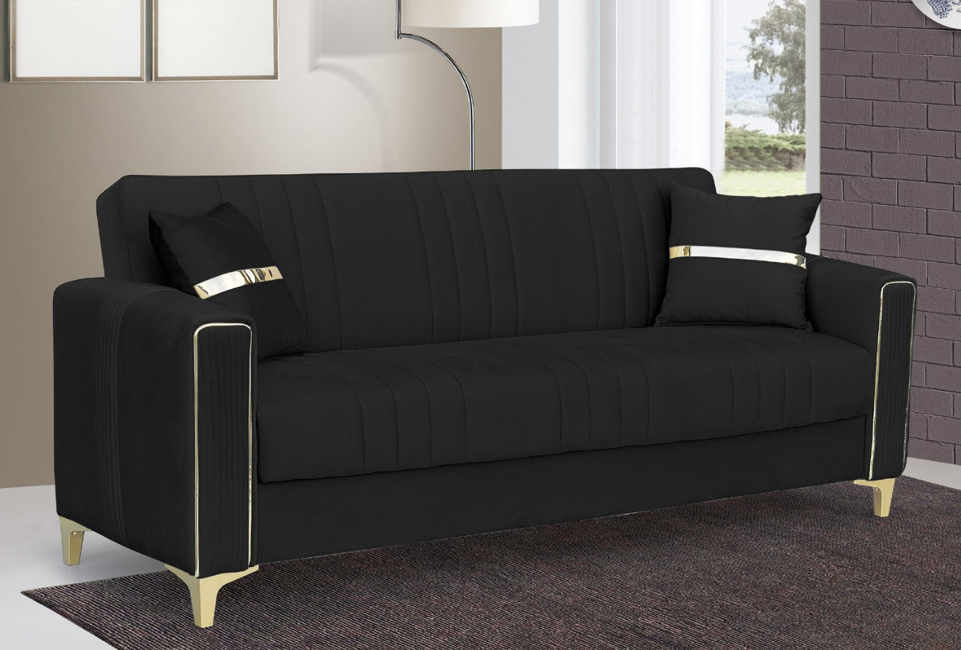 Black sofa bed with storage with gold accents in a room with a window and wall.