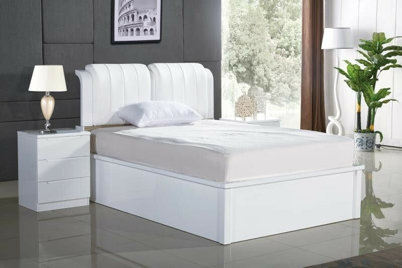 White Leather Headboard Double Ottoman bed with matching nightstand in a modern bedroom setting