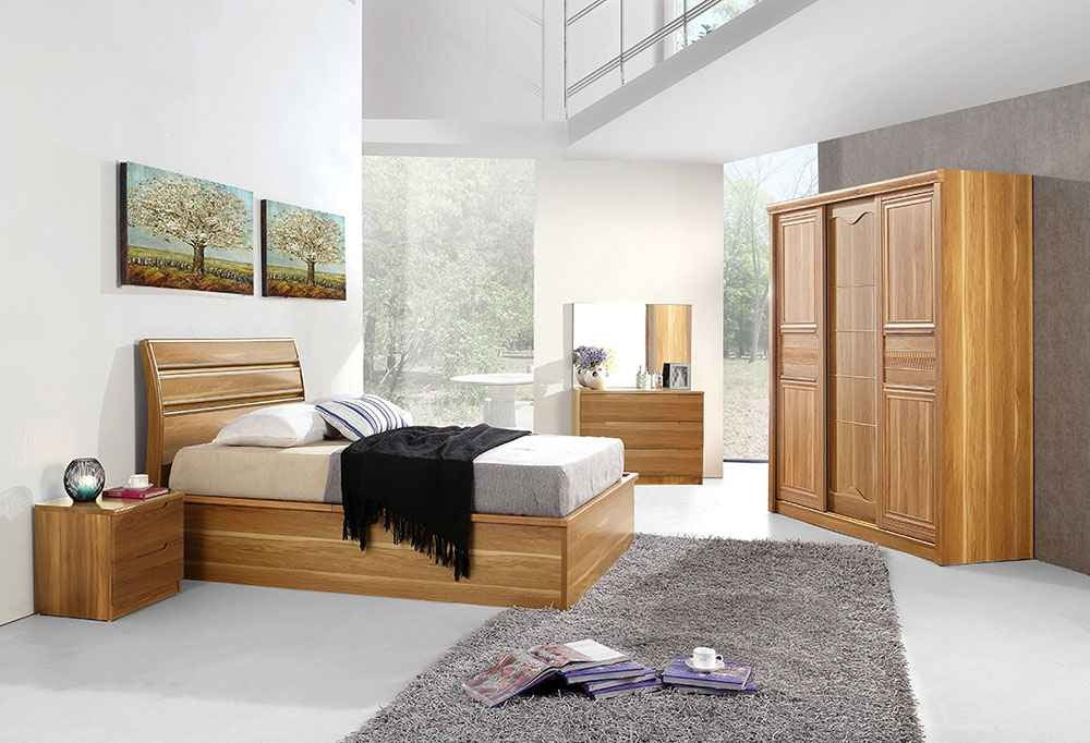 Modern bedroom with wooden bed with storage, wardrobe, and nightstands.