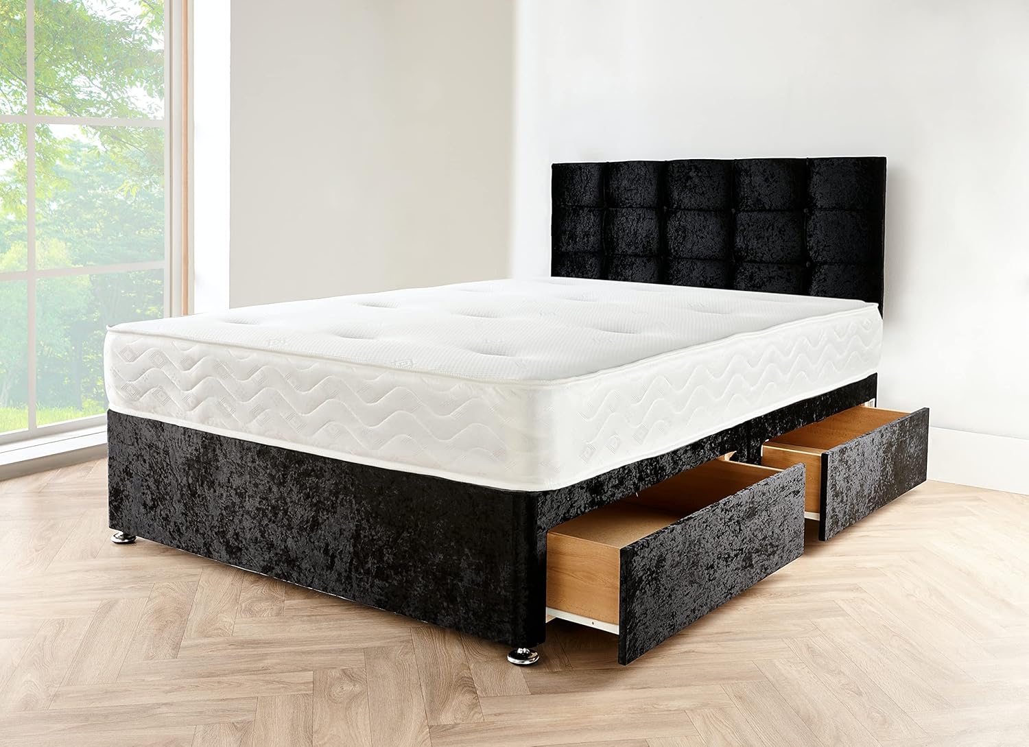 A cross-section of the 10-inch memory foam sprung mattress showing the inner spring coils and pressure-relieving foam layer.